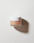 Lip mask container with 'Elessia' branding on a light background