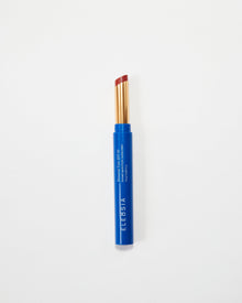 Eleusia Blue makeup lip tint on a white background