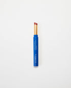 Blue Eleusia lip tint with visible brand name on a white background