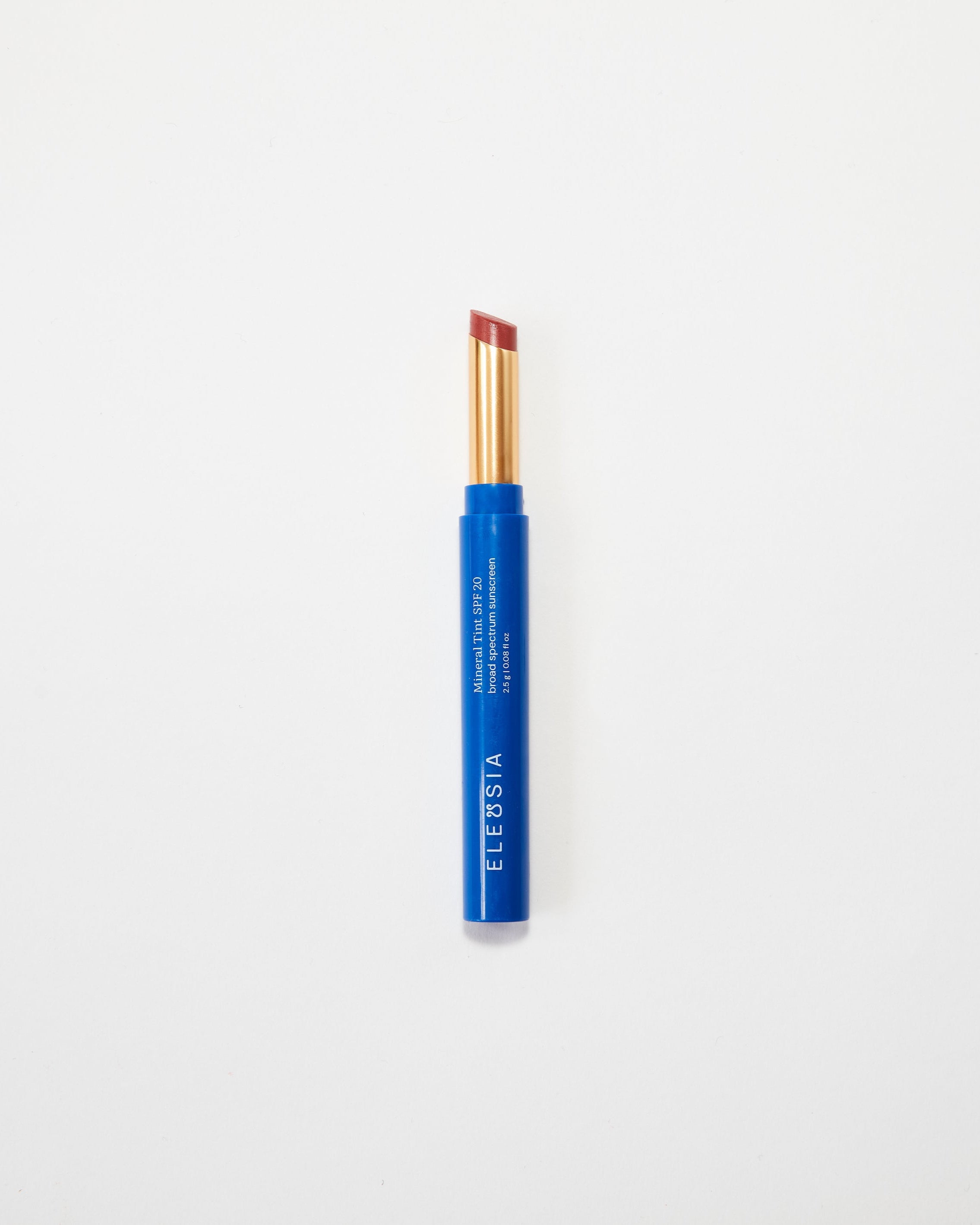 Blue Eleusia lip tint with visible brand name on a white background
